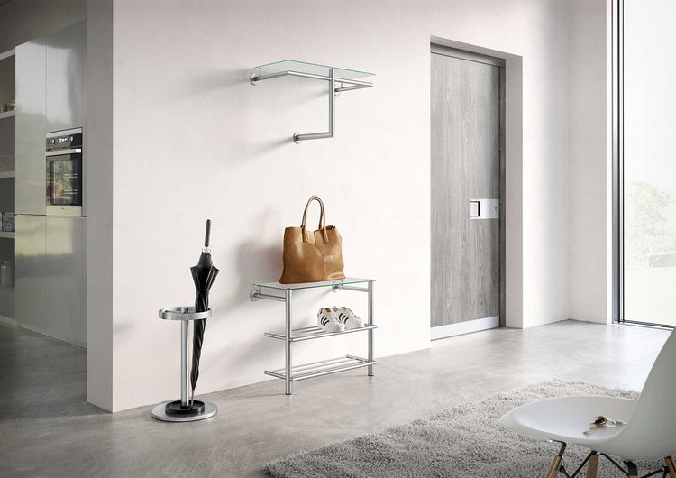 Unbrella stand and show rack in a minimalist home setting.