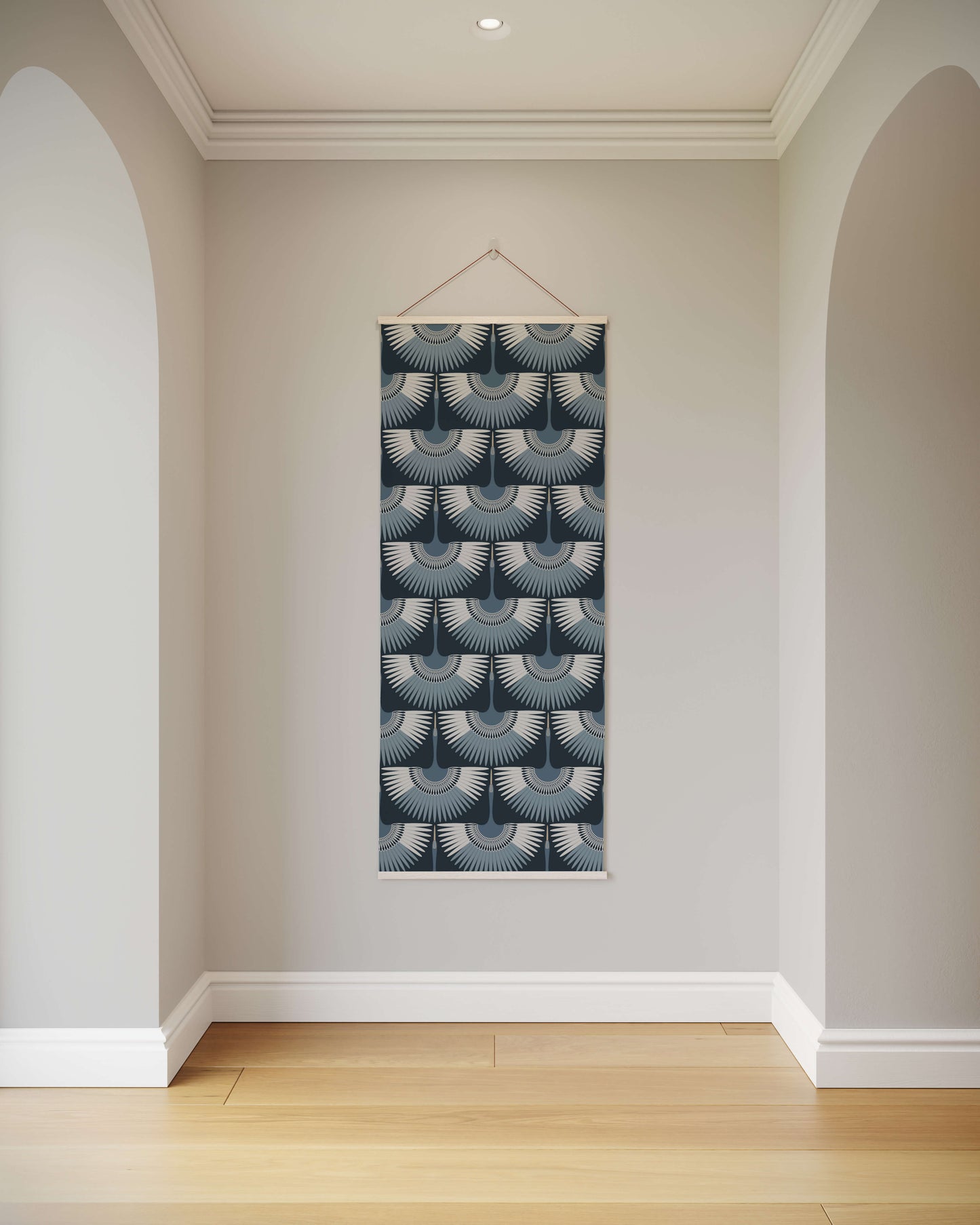 Decorative wall hanging with geometric pattern on a plain wall.