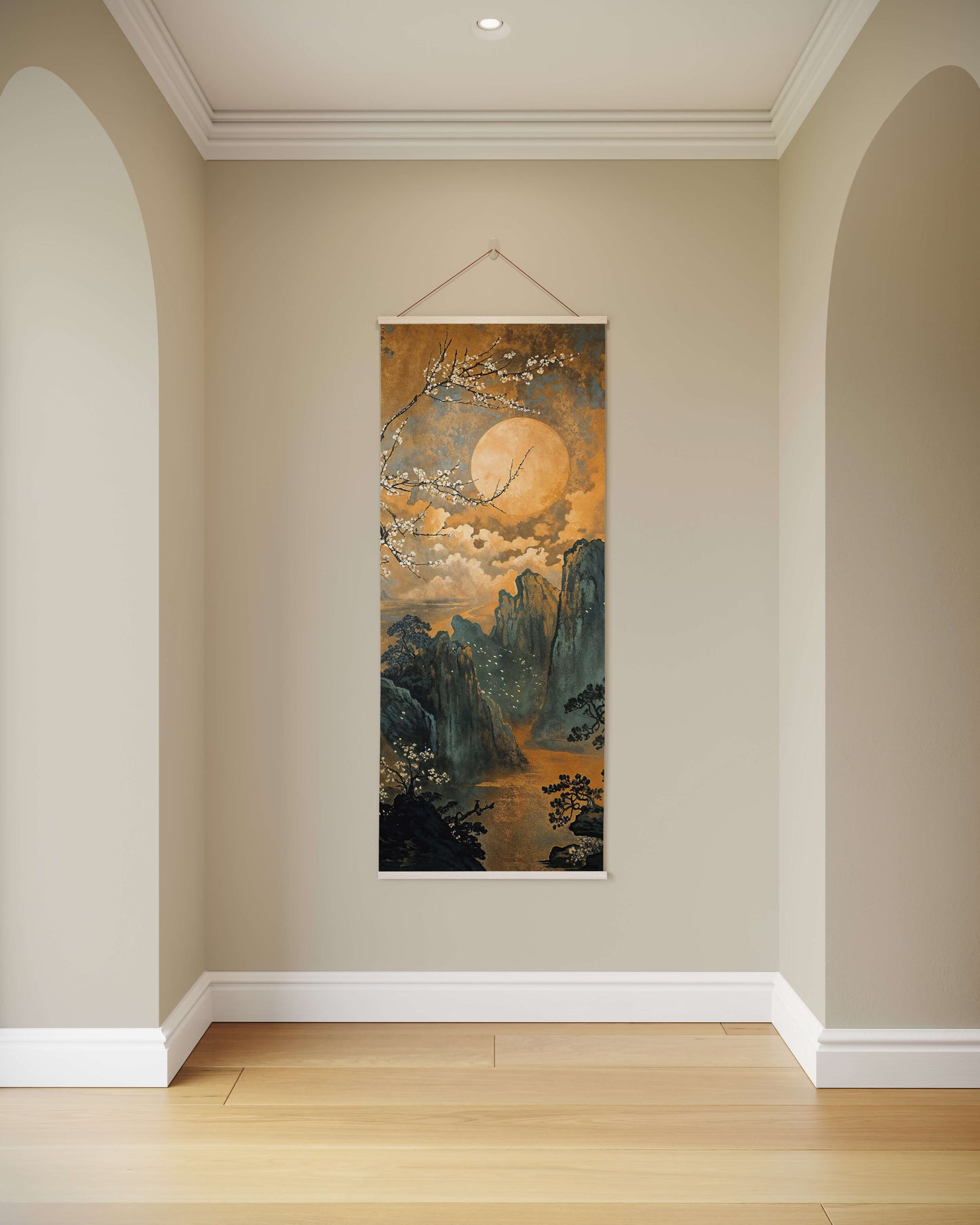 Decorative scroll hanging on a wall in a room with wooden flooring.