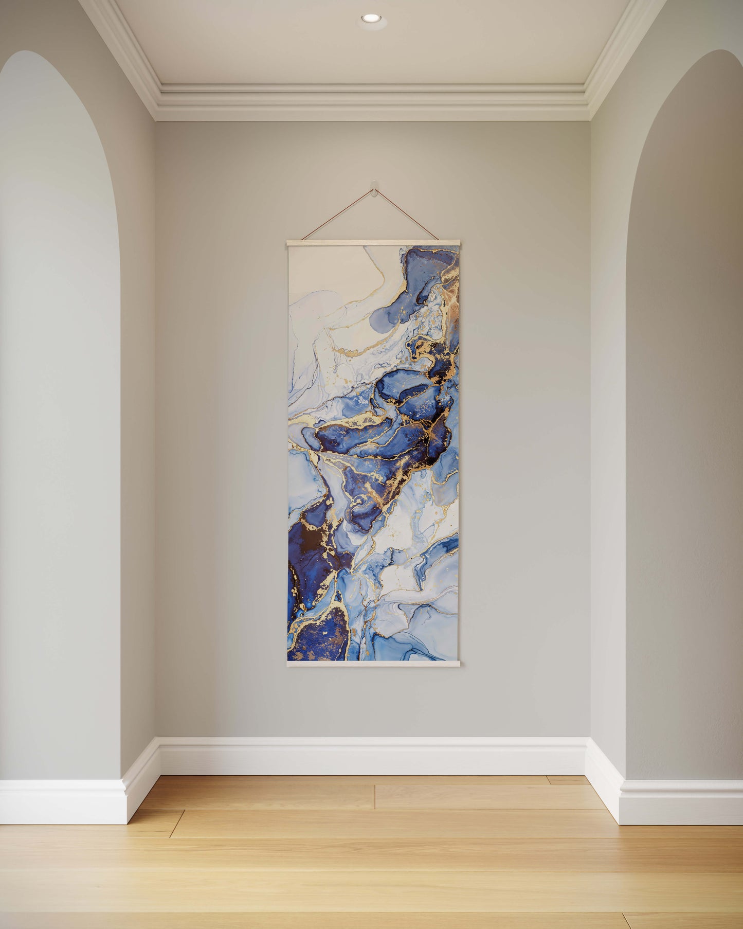 Abstract art hanging on a wall in a room with wooden flooring