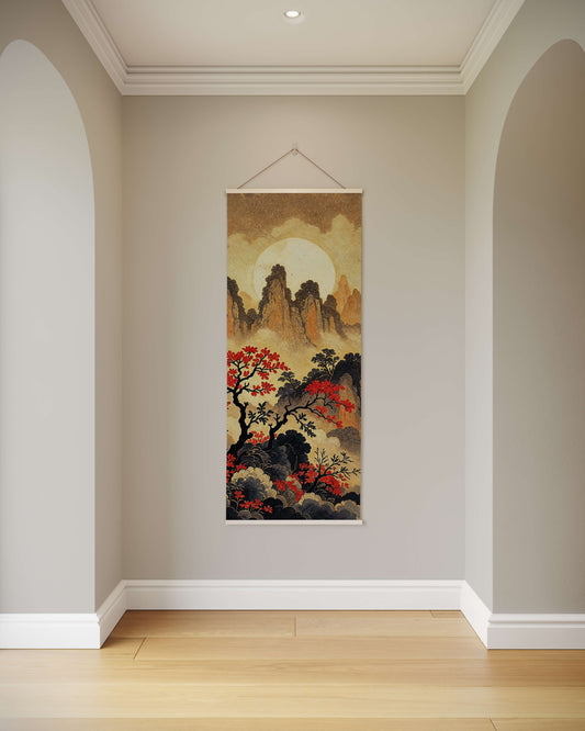 Decorative wall scroll with mountain and tree design hanging on a plain wall.
