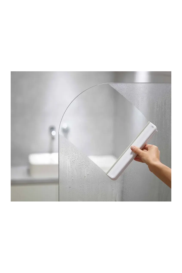 Shower Squeegee in use on a shower screen