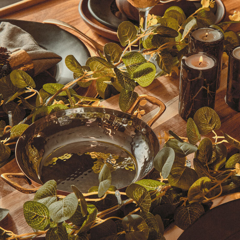 Copper balti dish shown from above