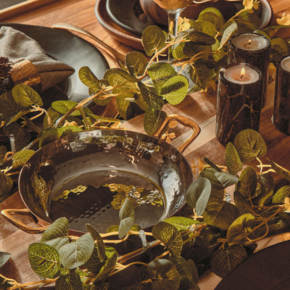 Copper balti dish shown from above