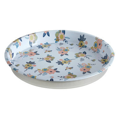 Close-up detail of the floral pattern on the metal tray
