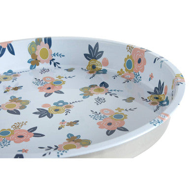 Floral serving tray styled with drinks and snacks