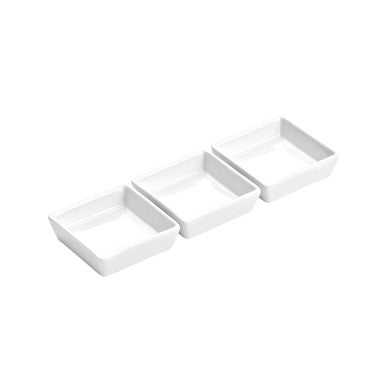 White porcelain serving dishes stacked
