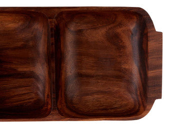 Two section serving dish on a dining table