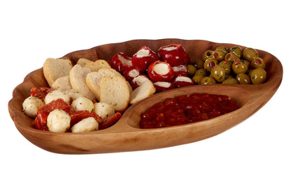 Chip and dip dish styled with olives and crackers