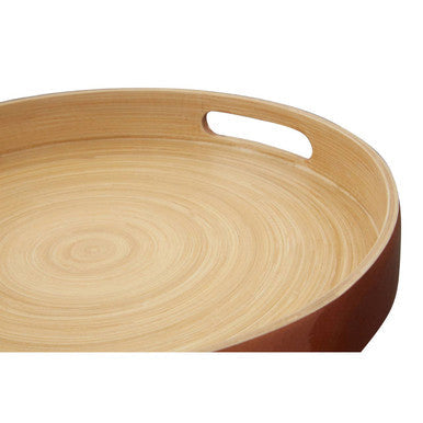 Close-up detail of the rose gold bamboo tray's cut-out handles