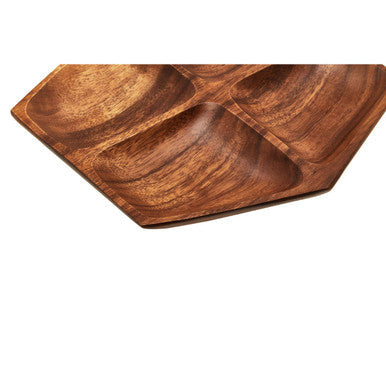 Four section serving dish styled with dips and nibbles
