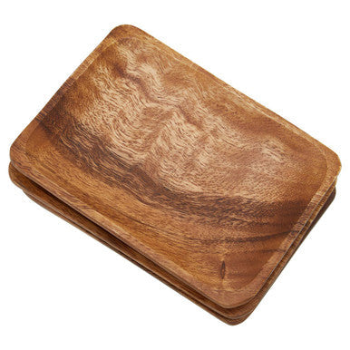 Acacia serving dishes stacked together