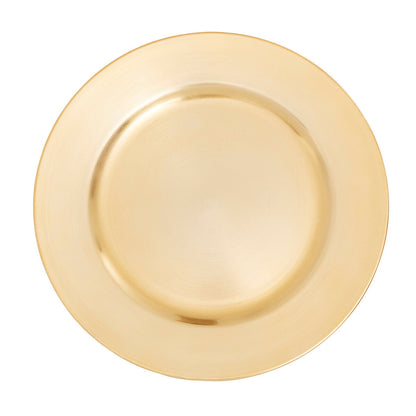 Flat gold charger plate styled on a dining table
