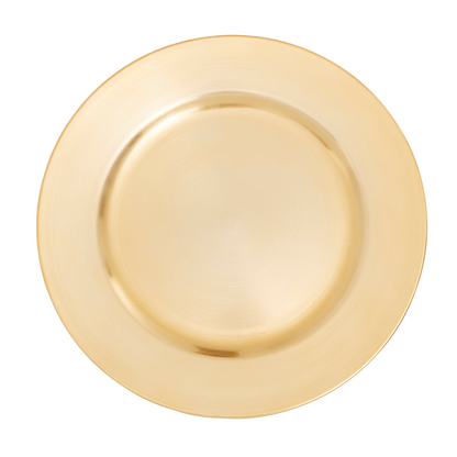 Gold charger plate styled with tableware for a formal dinner setting