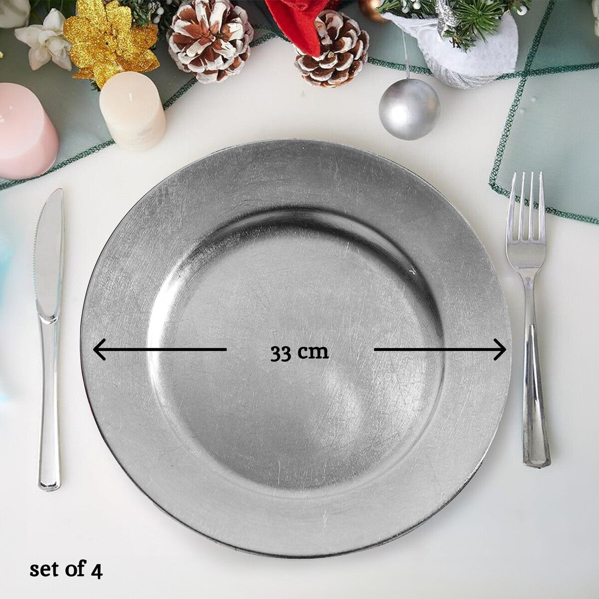 Silver charger plate styled with tableware for a formal dinner setting