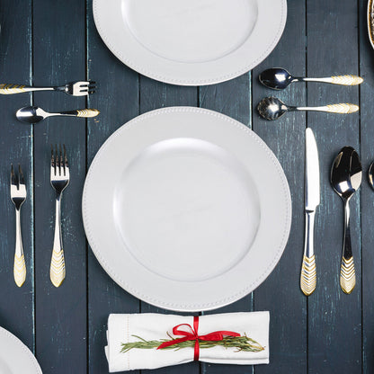 Silver dotted charger plate styled on a dining table