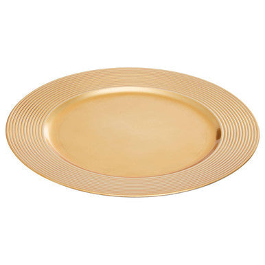 Side view of the gold charger plate showing the ribbed rim