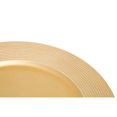 Gold charger plate styled with tableware for a formal dinner setting