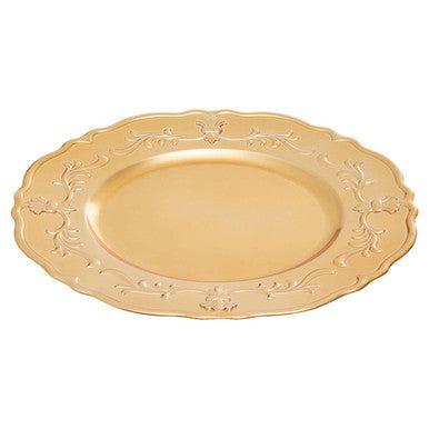 Close-up detail of the scrollwork on the gold baroque charger plate