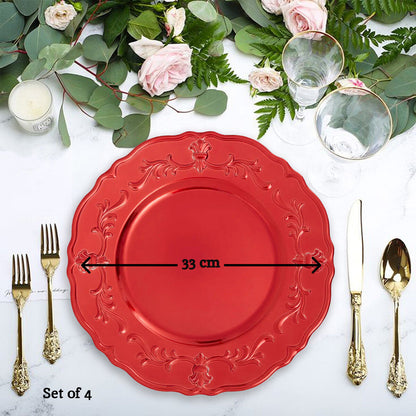 Side view of the red baroque charger plate showing the scalloped edge