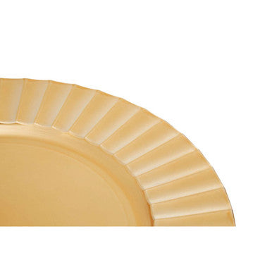 Close-up detail of the gold charger plate's wavy rim texture