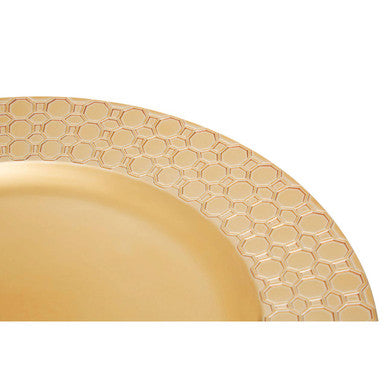 Close-up detail of the honeycomb pattern on the gold charger plate