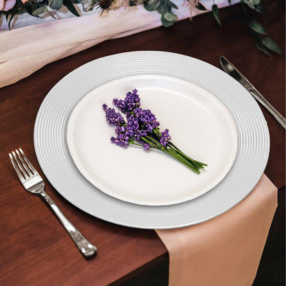 Silver ribbed charger plate styled on a dining table