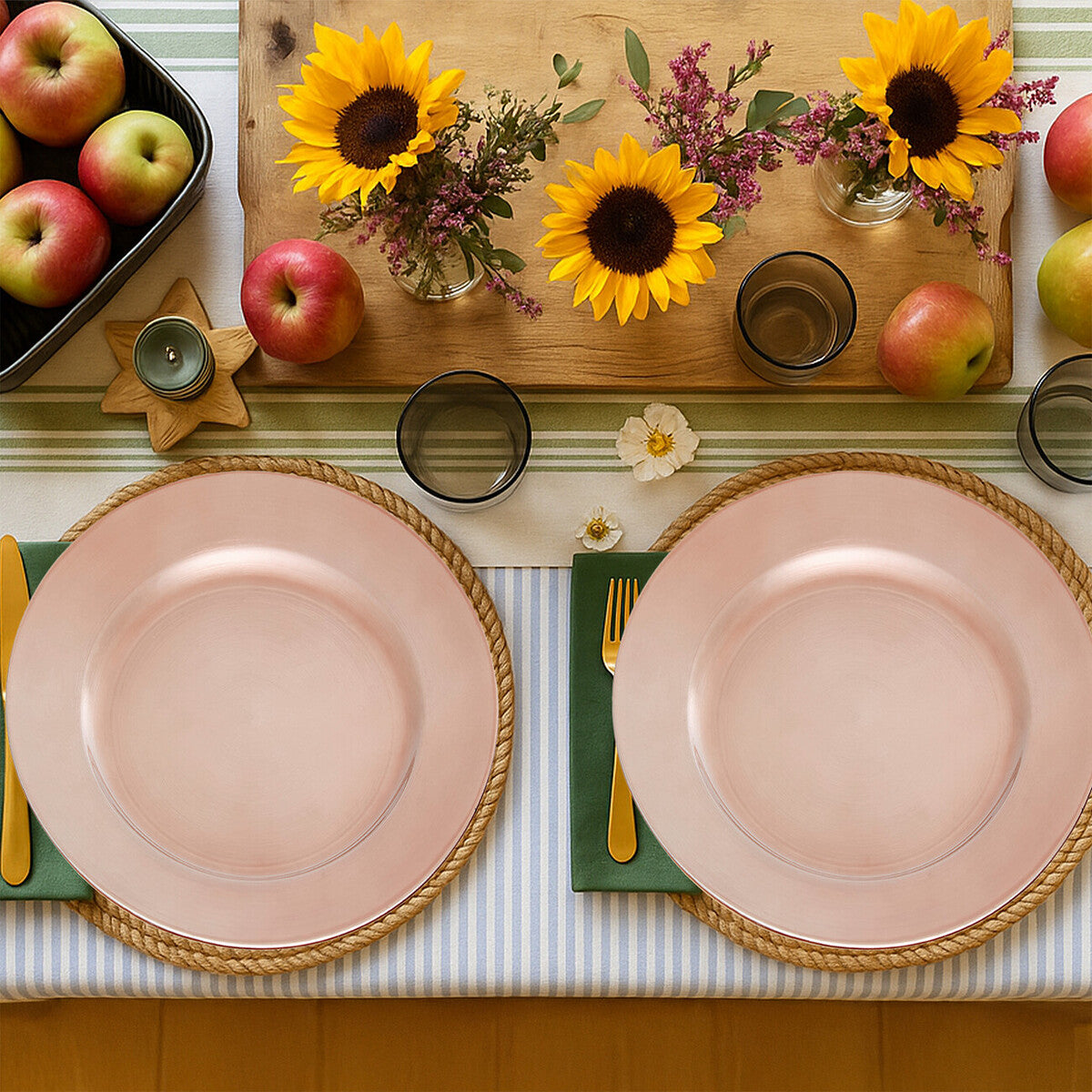 Rose gold charger plate styled with tableware for a formal dinner setting