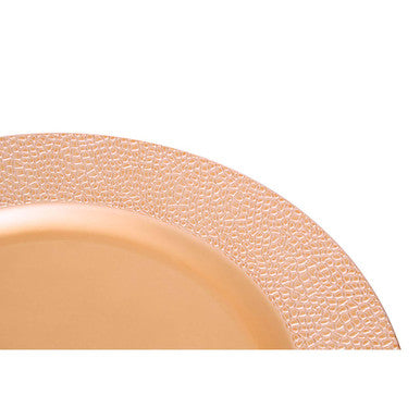 Rose gold pebble effect charger plate styled on a dining table