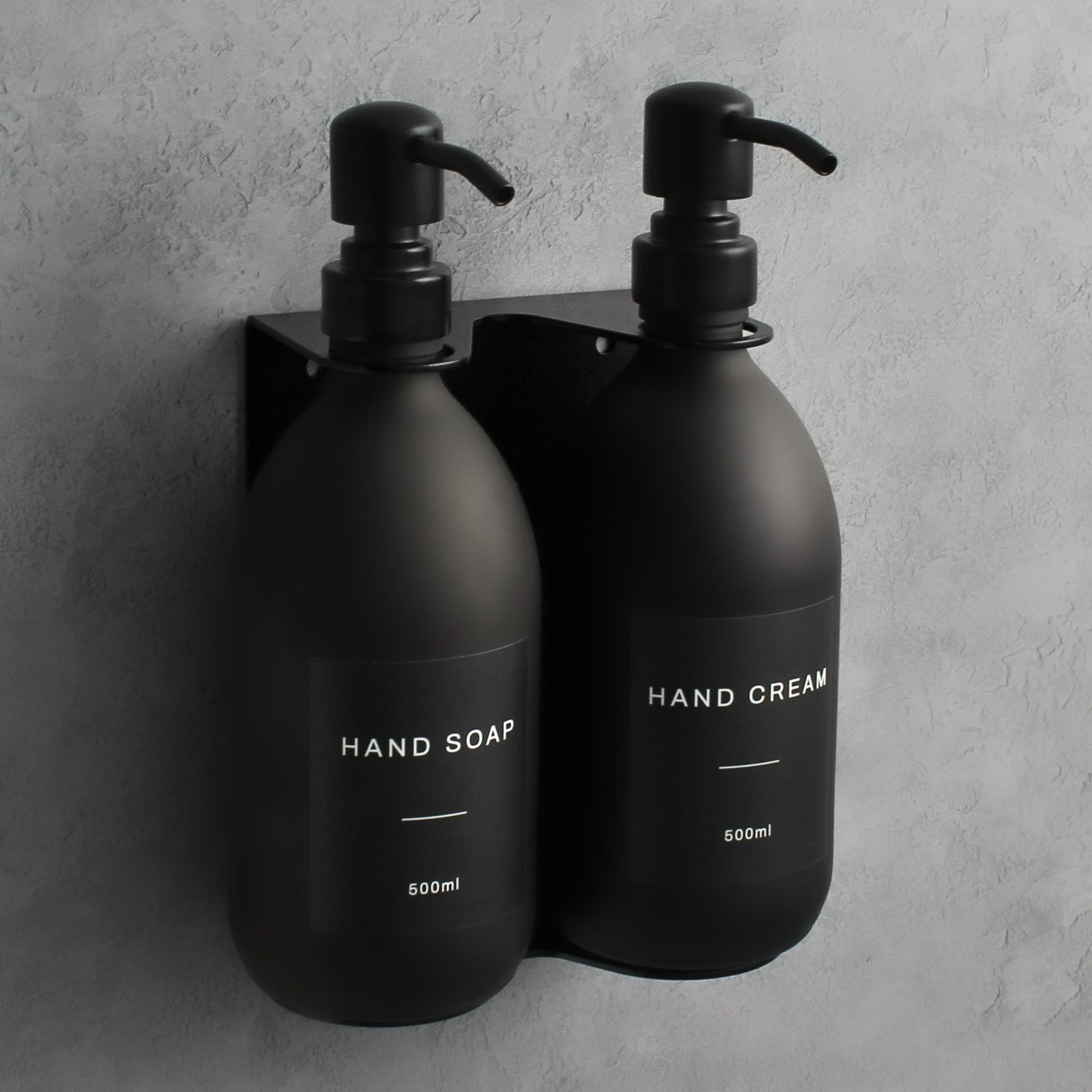Namie Matte Black Wall Mounted Dispenser Bracket Set with Matte Black Bottles