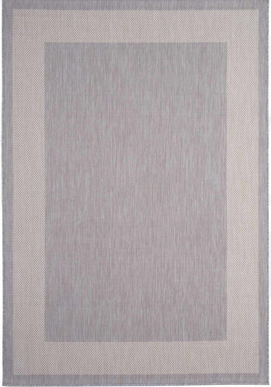 Rectangular area rug with a grey and beige border on a white background