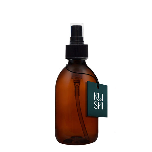 Brown spray bottle with black cap and 'KUISHI' tag on a white background