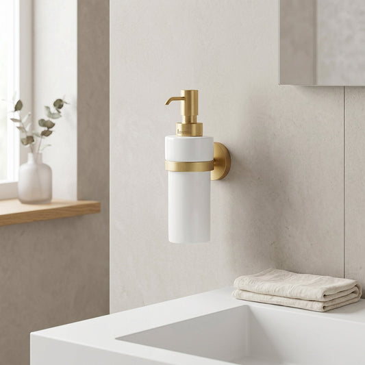 Bathroom setting with a wall-mounted soap dispenser and a sink.