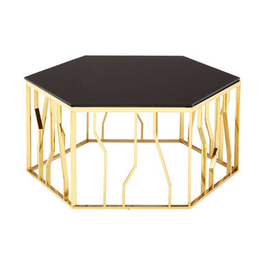 Hexagonal coffee table with black top and gold metal frame on a white background