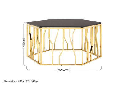 Hexagonal table with gold metal frame and black top, showing dimensions on a white background.
