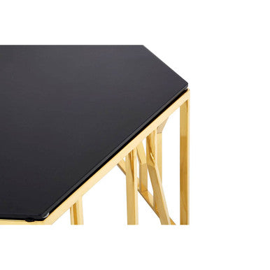 Black table with gold metal legs on a white background