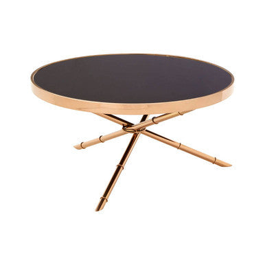 Round table with black top and rose gold base on a white background
