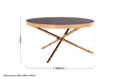 Round coffee table with bronze legs and black top, showing dimensions on a white background