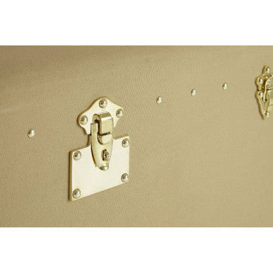 Beige suitcase with gold lock and decorative studs on a white background