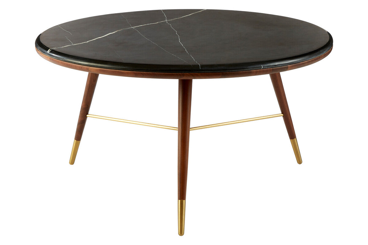 Round coffee table with black marble top and wooden legs on a white background