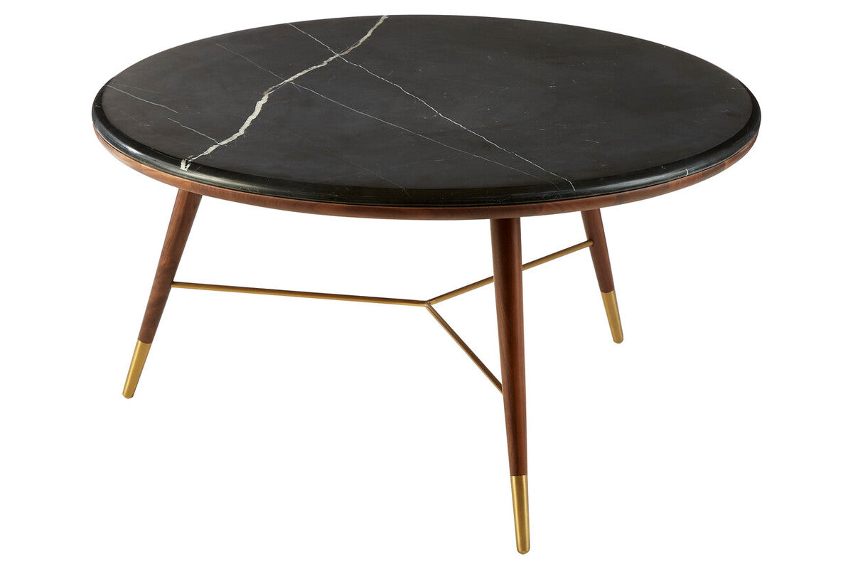 Round coffee table with black marble top and wooden legs on a white background