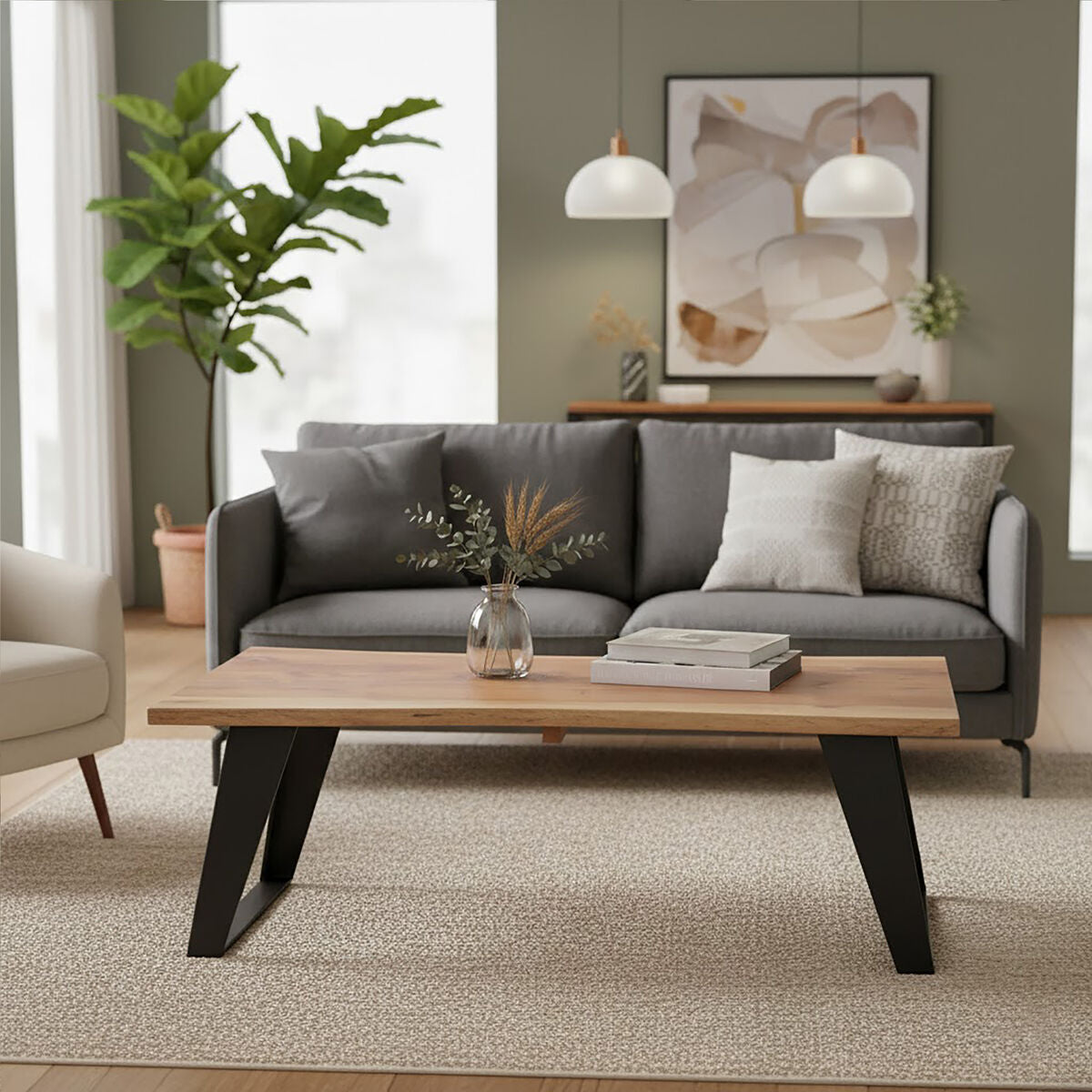Live edge acacia wood coffee table with black iron legs, styled living room