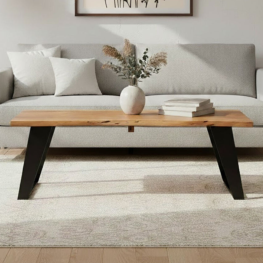 Live edge acacia wood coffee table with black iron legs, front view