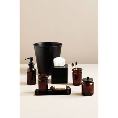 Allegra Kiara Brown Glass Soap Dispenser shown in a bathroom setting