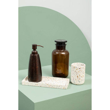 Allegra Dark Bronze Hammered Effect Soap Dispenser styled on a bathroom counter