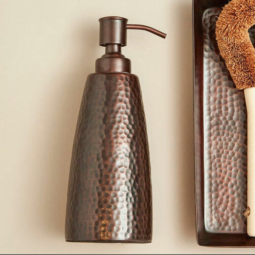 Allegra Dark Bronze Hammered Effect Soap Dispenser styled on a vanity