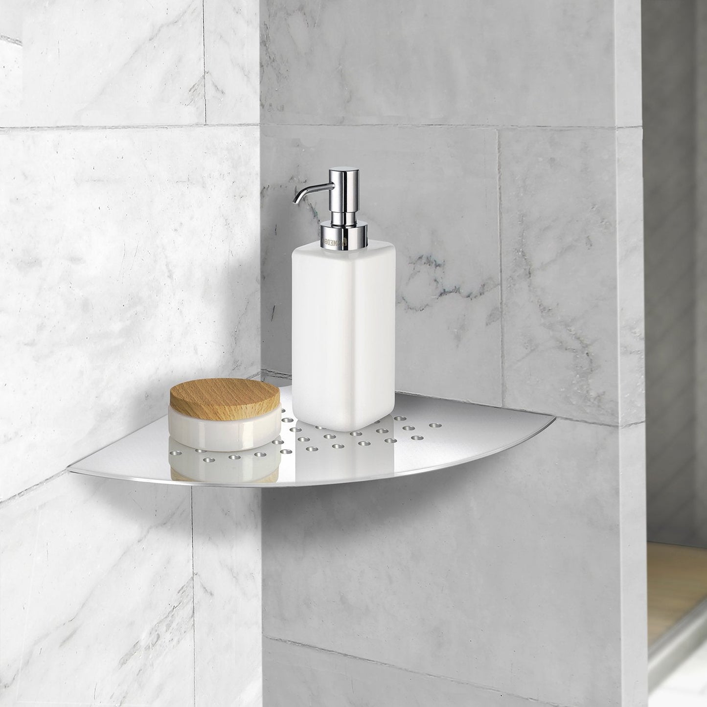 Corner shelf with a soap dispenser and container against a marble wall.