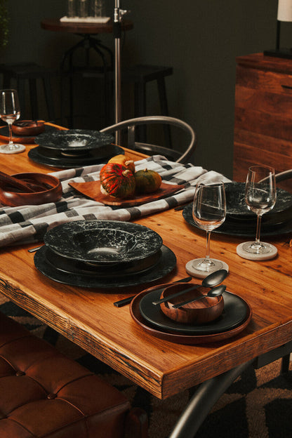 Acacia wood plate styled with fruit as a serving centrepiece