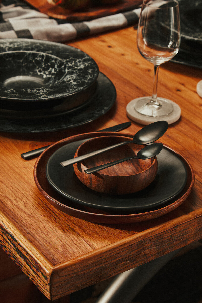 Close-up detail of the natural acacia wood grain
