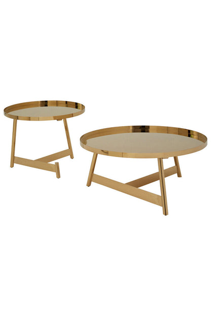 Two round wooden coffee tables with gold trim on a white background
